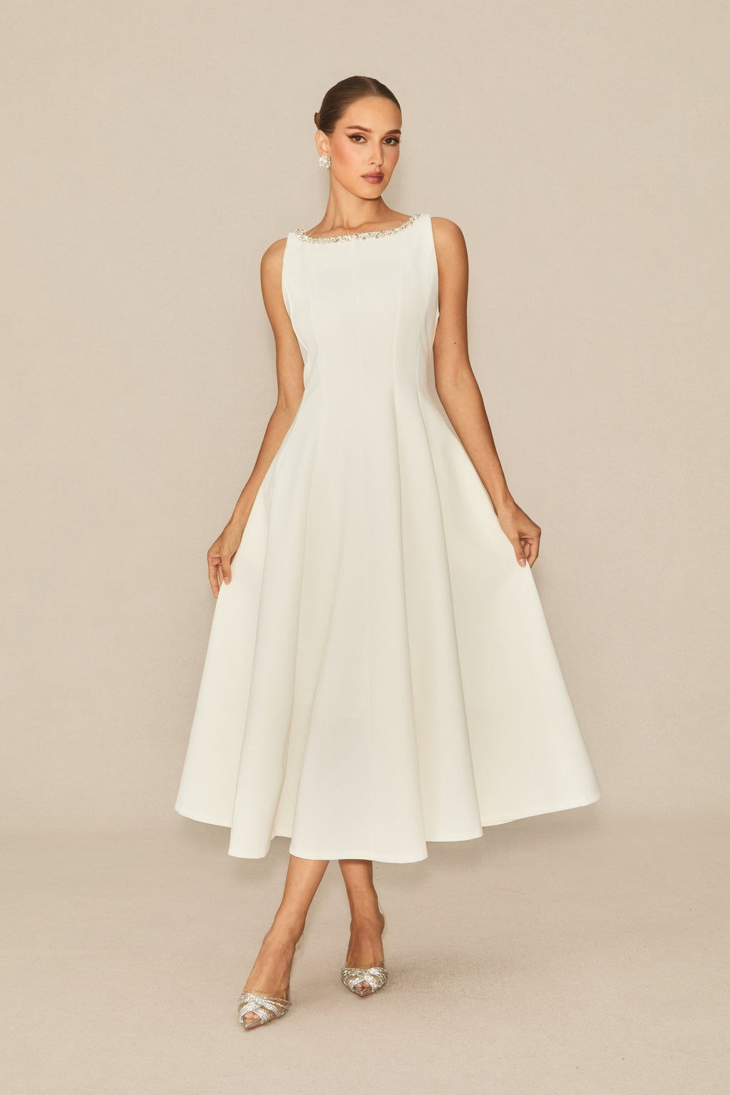 Won your heart with this white embellished sleeveless midi dress