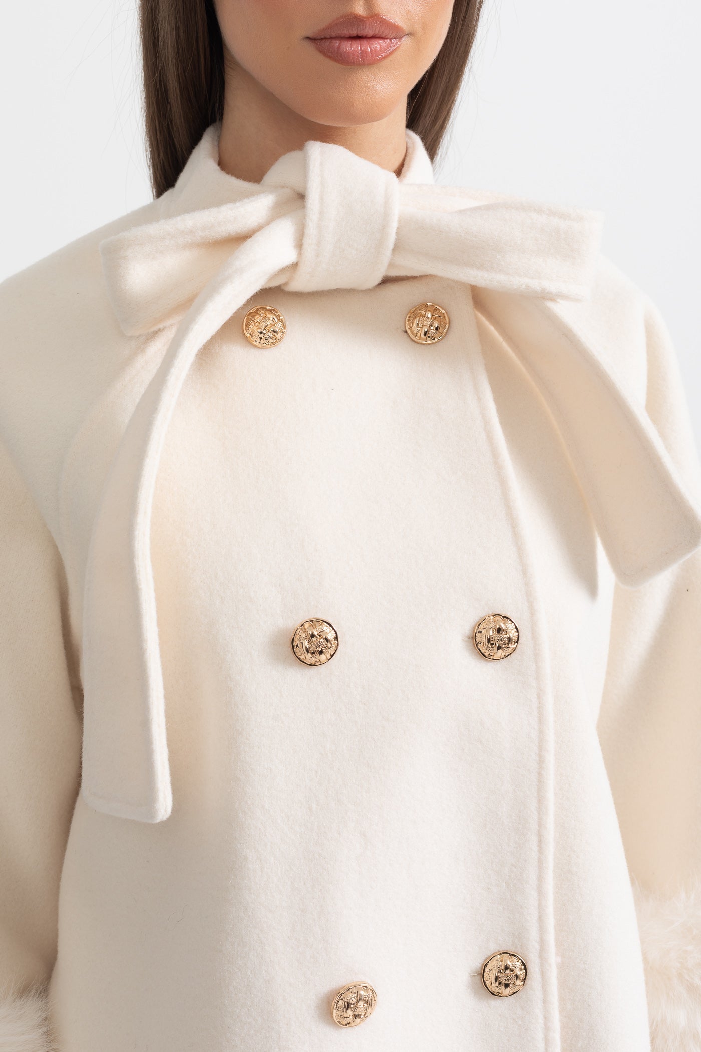 Double Breasted Overcoat With Fur Cuff Accents And Neckline Ribbon - Ivory